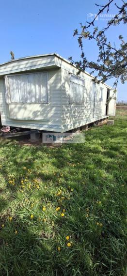 Ponúkame na predaj záhradu s obytným domom v obľúbenej záhradkárskej oblasti Ozón